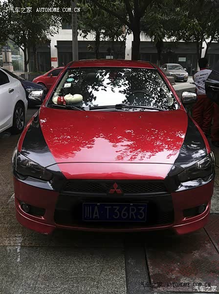 我和老婆仍然很喜欢东南拖拉机厂出品的翼神牌小轿车